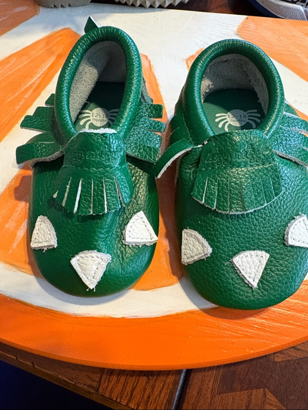 Itzy Ritzy Green Kids Leather Moccasins with White Accents